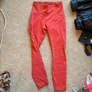 Lululemon coral leggings with mesh detail
